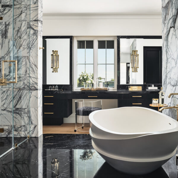 The Posh Arizona Oasis That Blends Beloved Pieces With Luxury Materials black and gray master bathroom with contemporary soaking tub