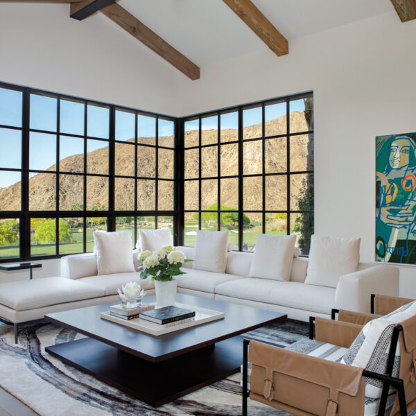 Warmth, Character And Surprise Accents Elevate This California Family Retreat family room with black steel corner windows