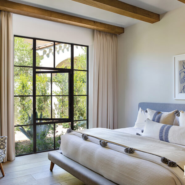 Warmth, Character And Surprise Accents Elevate This California Family Retreat neutral guest room with west elm bed