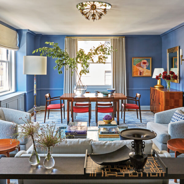A Spunky Color Story Elevates A PreWar Duplex With Old New York Charm lounge space in blue dining room