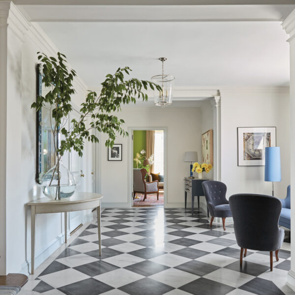 A Spunky Color Story Elevates A PreWar Duplex With Old New York Charm black-and-white tile indoor entry