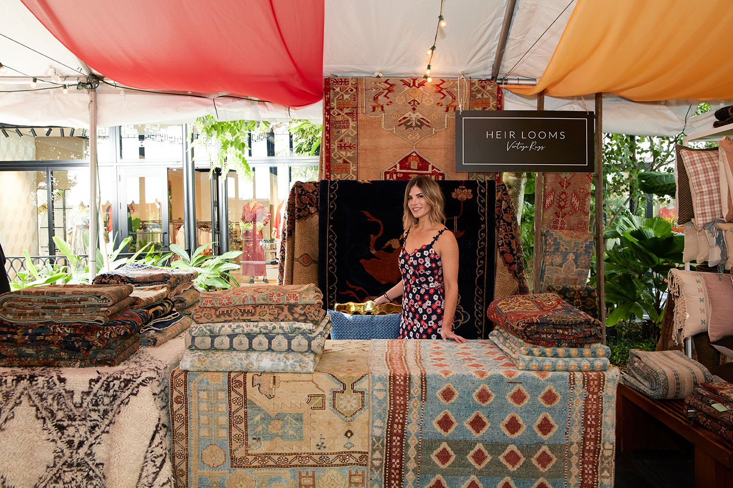 rugs for sales under tent at the souk