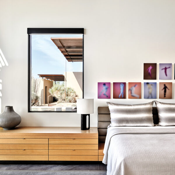 An Iconic Arizona Home’s Refresh Proves Sometimes All You Need Are The Right Pieces The master bedroom with artwork by Bill Armstrong above the custom bed.