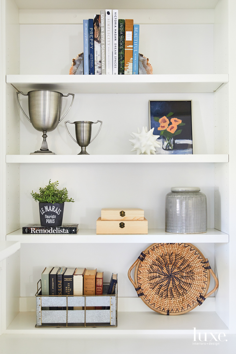 Shelving in the music room allows the owners to display their art and objects.