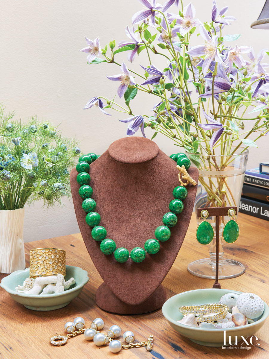 green necklace and earings with other jewerly
