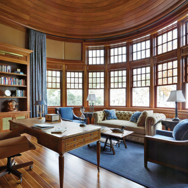 It Was All Hands On Deck For A Lake Michigan Vacation Home With Sailing Vibes The circular office has a leather walls, a circular ceiling and a walnut desk.