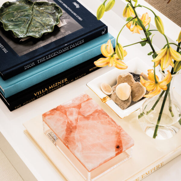 Ties To An Iconic Palm Beach Hotel Inspire An Equally Chic Villa All About Simple Luxury books on a coffee table