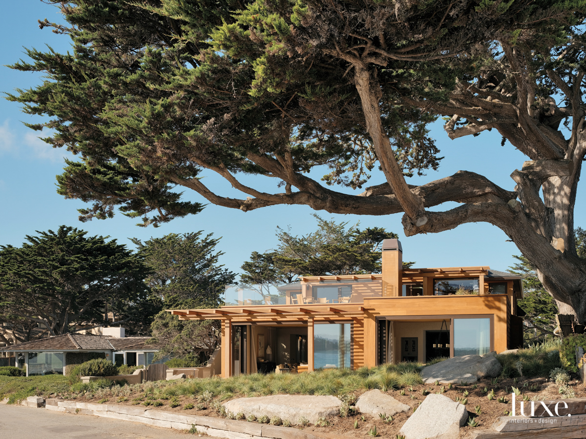 A modern, wood-clad home blends...