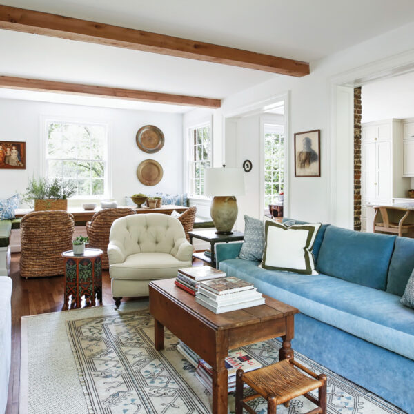 A Design Insta Crush Yields A Soulful Remodel Of A Nashville Home family room wood beams blue couch and amish coffee table