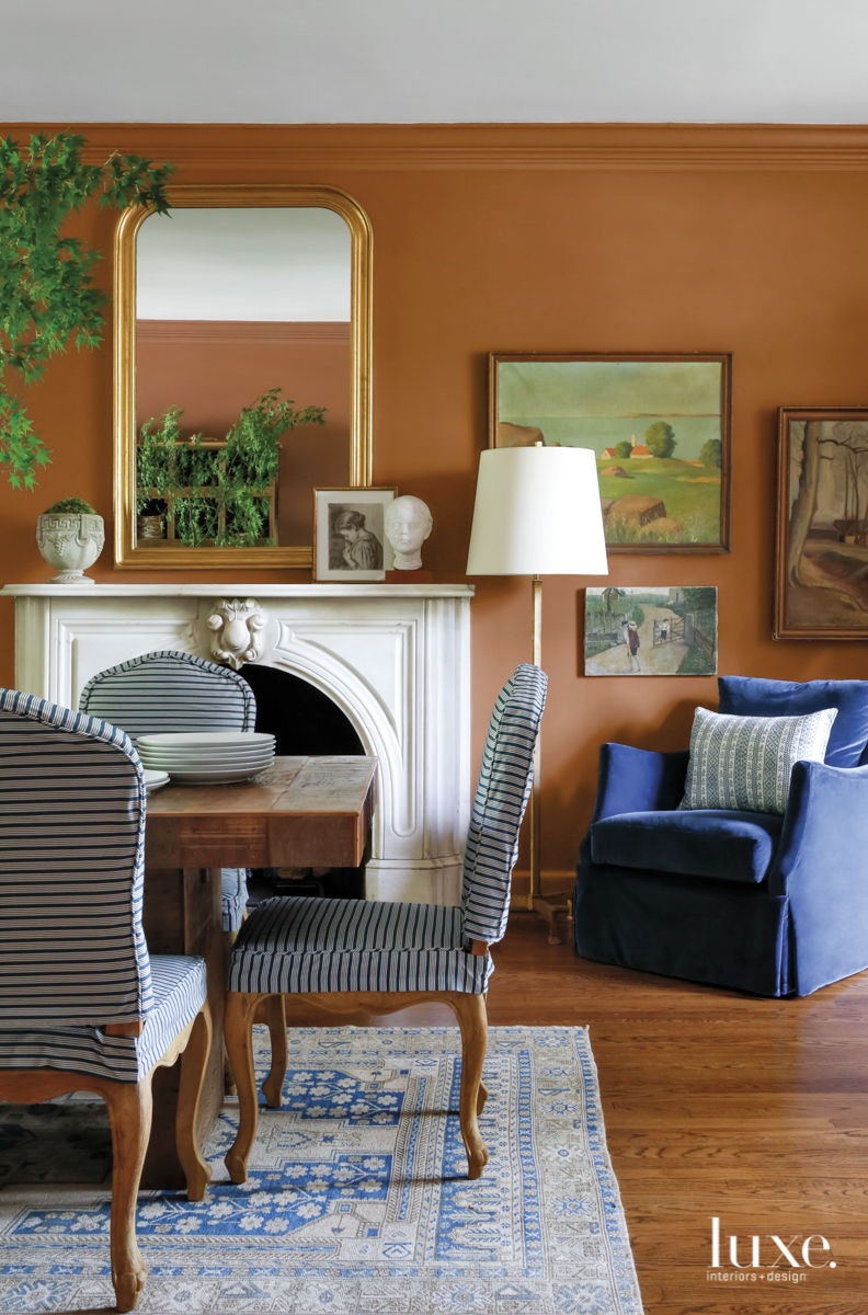 blue armchair rust-colored traditional living room