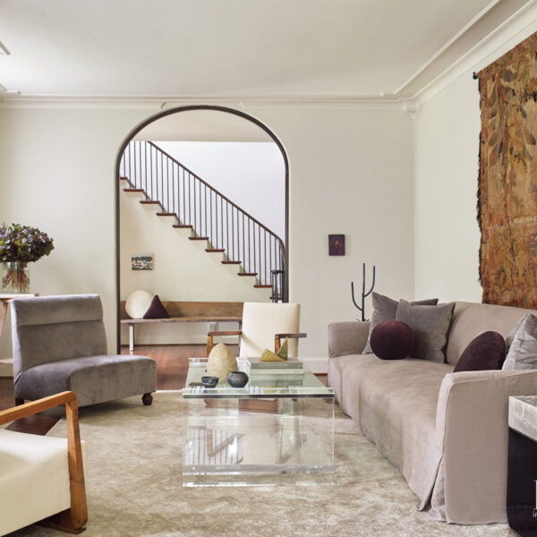 An Exquisite Houston Home Perfects The Recipe For Mixing Contemporary With Fine Antiques A formal living room’s eclectic mix of furnishings including a custom Belgian-style sofa and velvet-upholstered slipper chair
