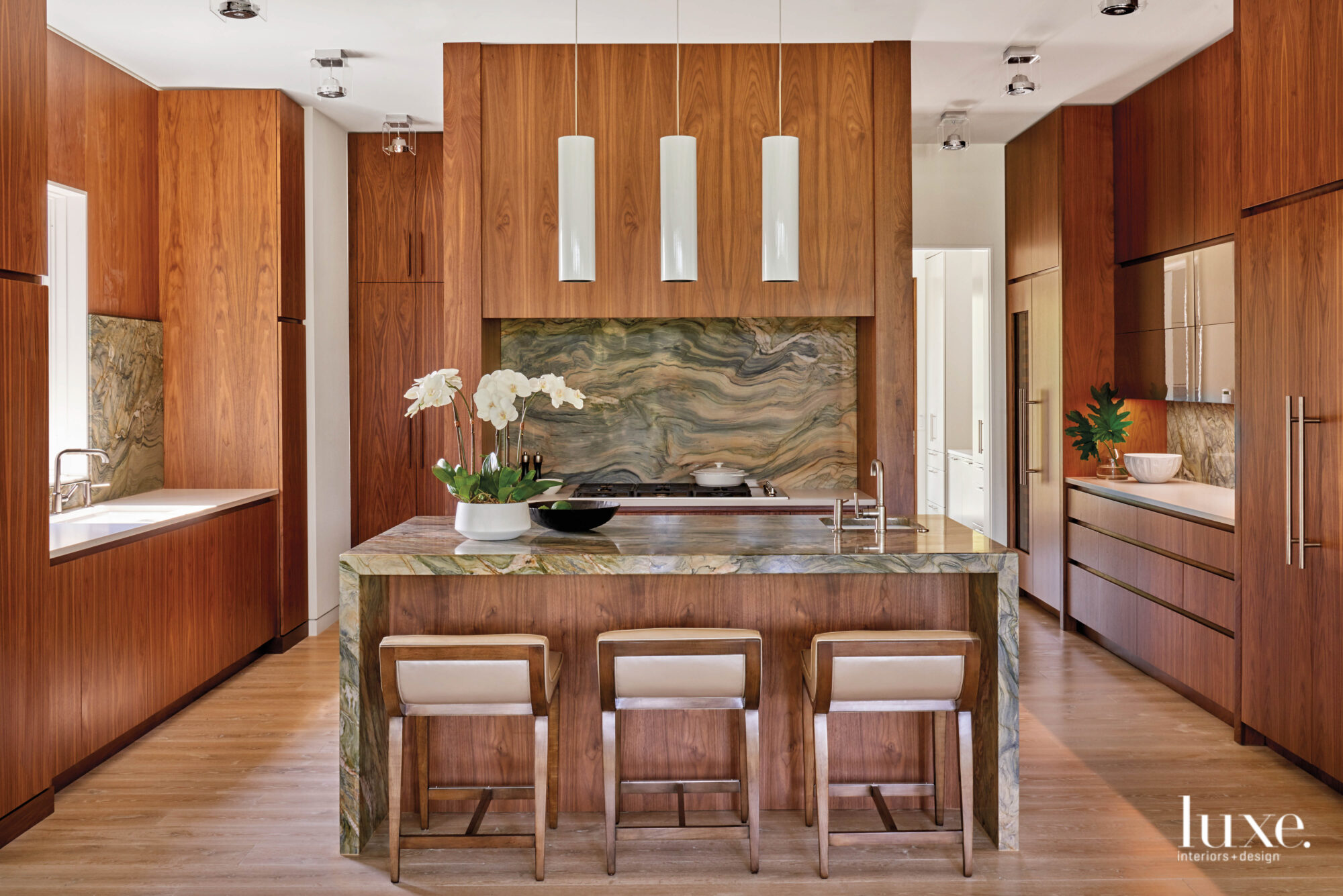 Rich Wood Accents Take Center Stage In This Coastal Kitchen