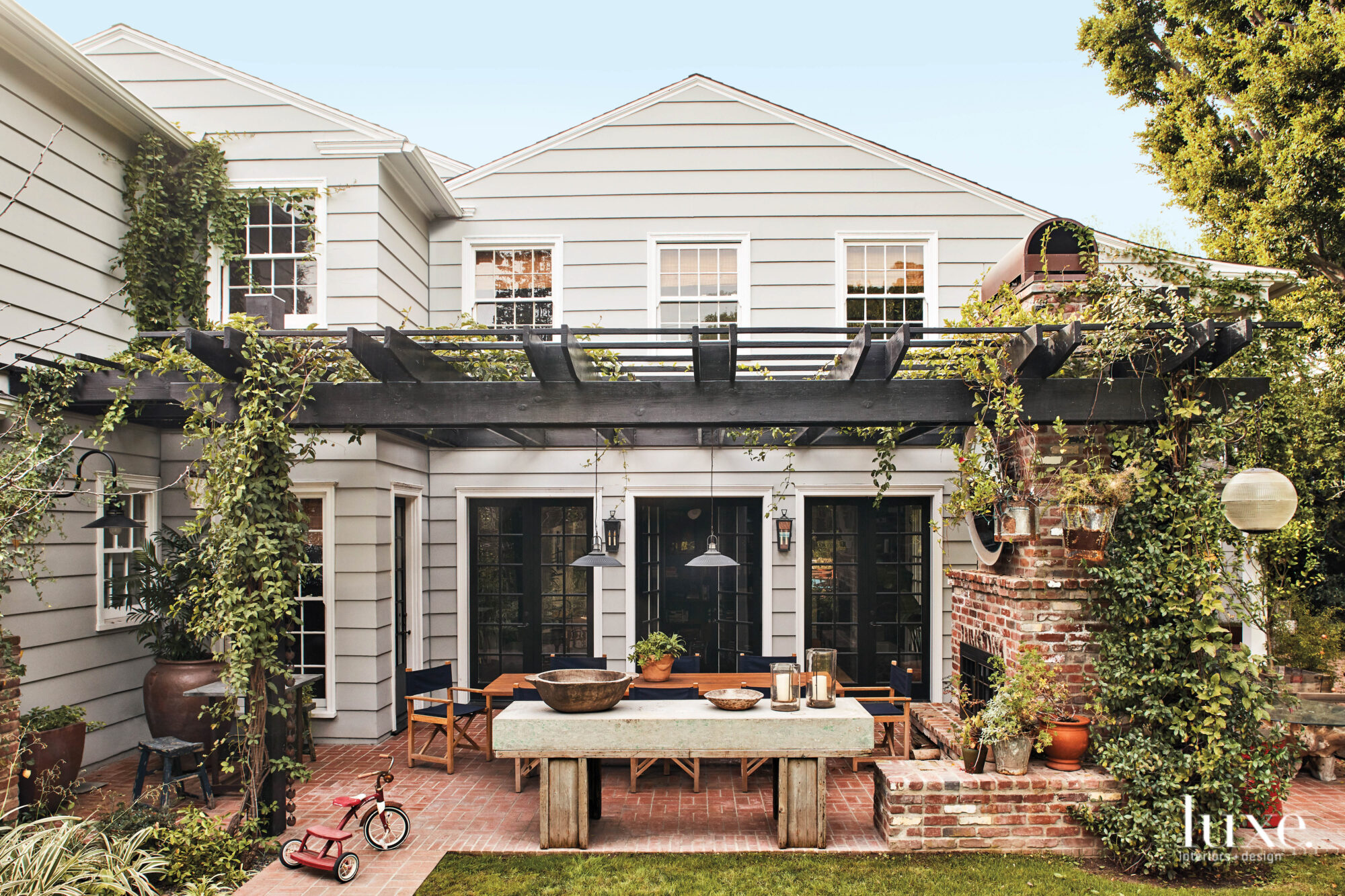 Exterior dining terrace of Los Angeles colonial revival.