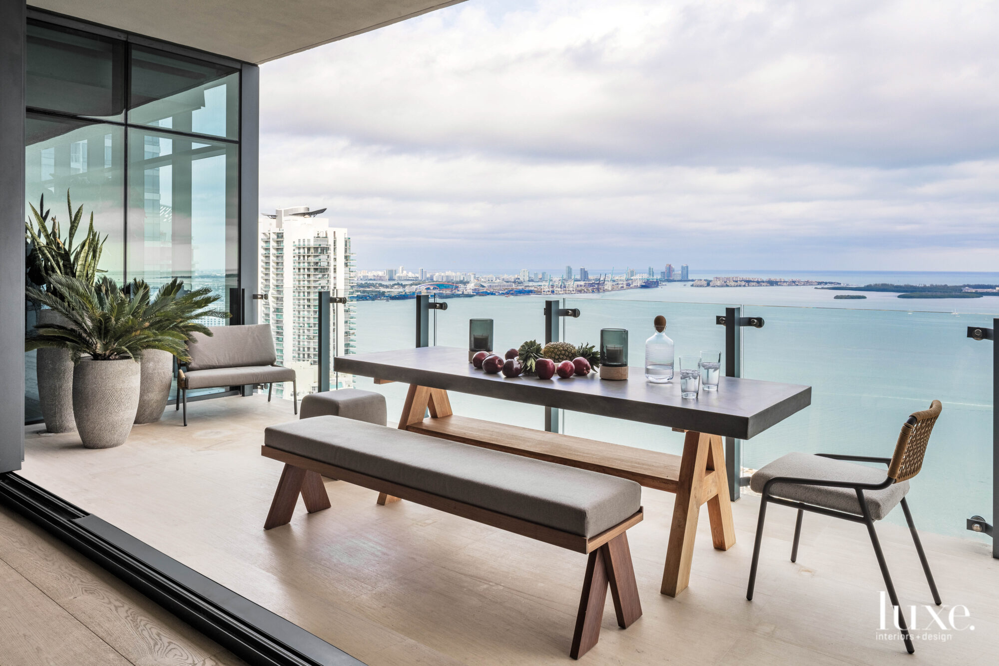 An outdoor dining area overlooking the waters of Biscayne Bay.