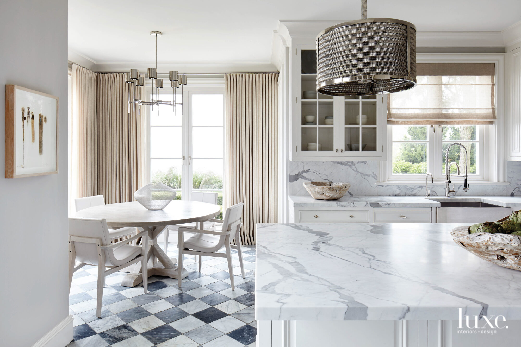 white kitchen checkerboard floor and marble countertops