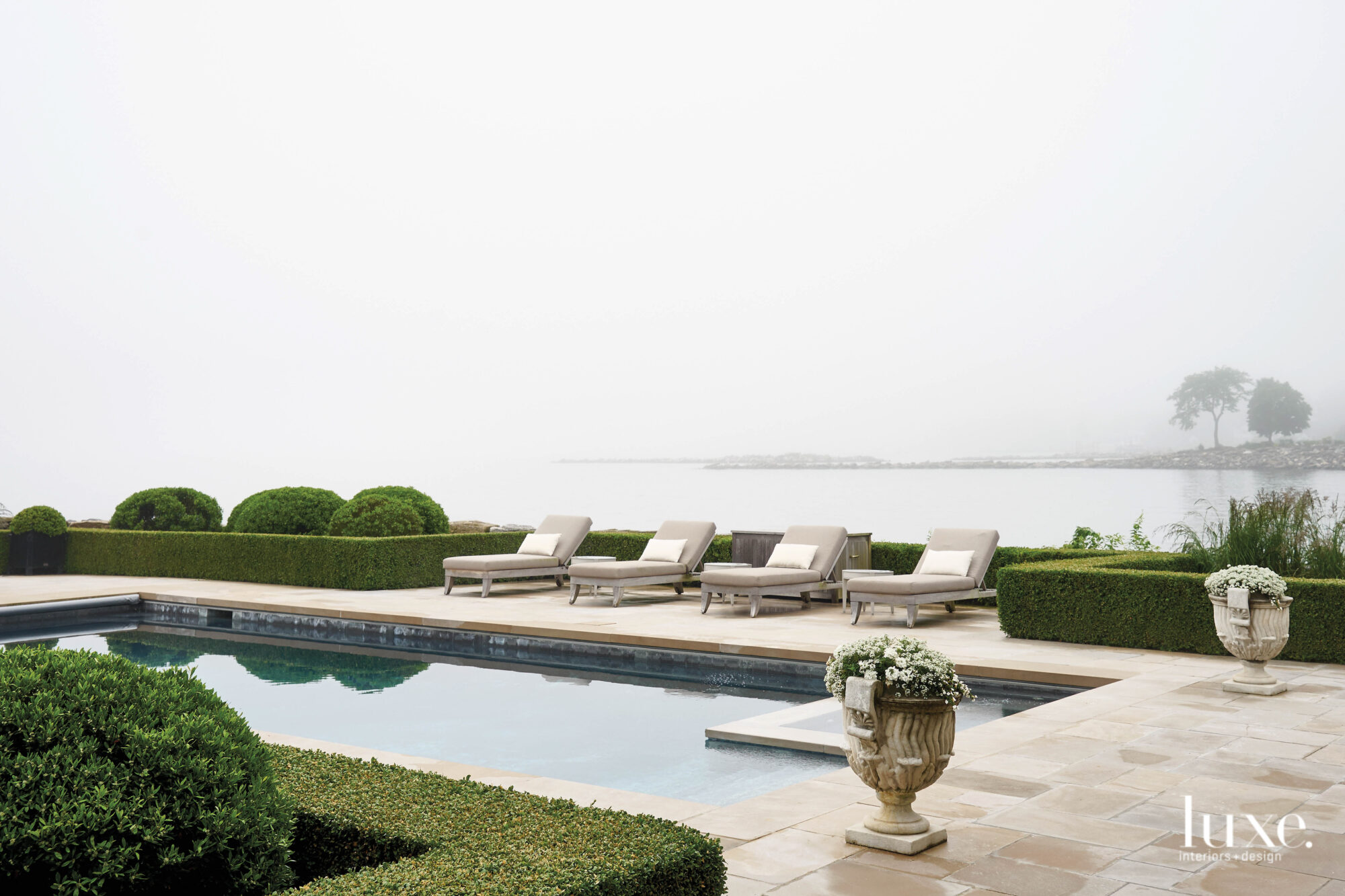 outdoor furniture pool with view of long island sound
