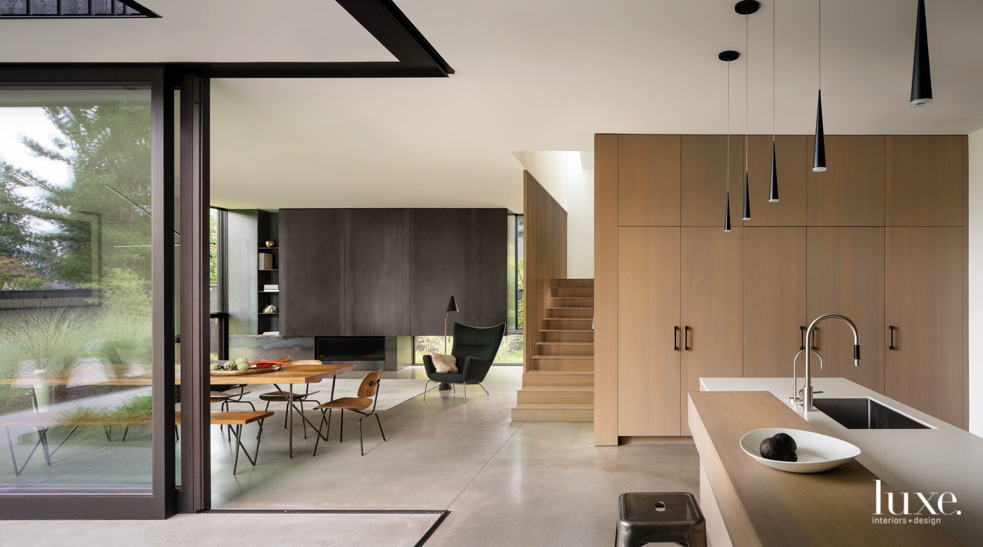 View of dining, living and kitchen spaces