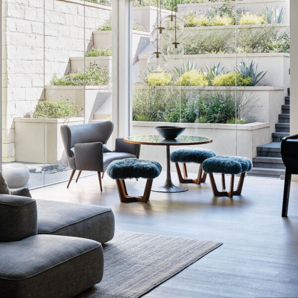 Faith And Trust In A Bay Area Designer Led To A Home Full Of Textural Touches And Custom Furnishings A lower-level seating area looks out to a terraced planting area.