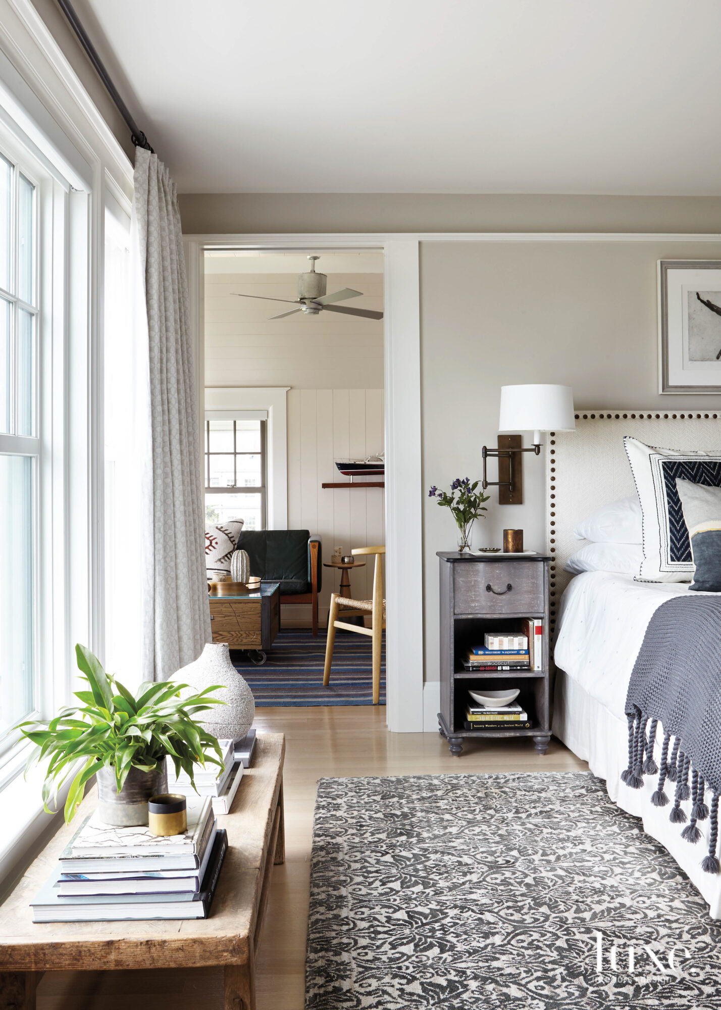 white master bedroom with gently worn pieces