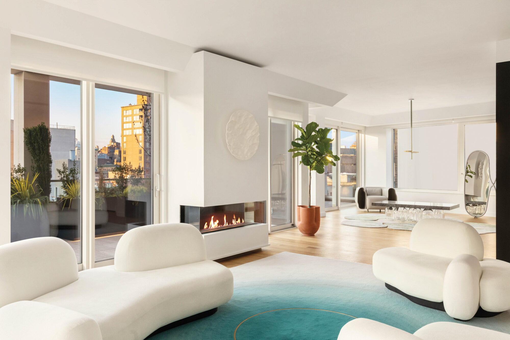 living room with fireplace in Manhattan luxury high rise
