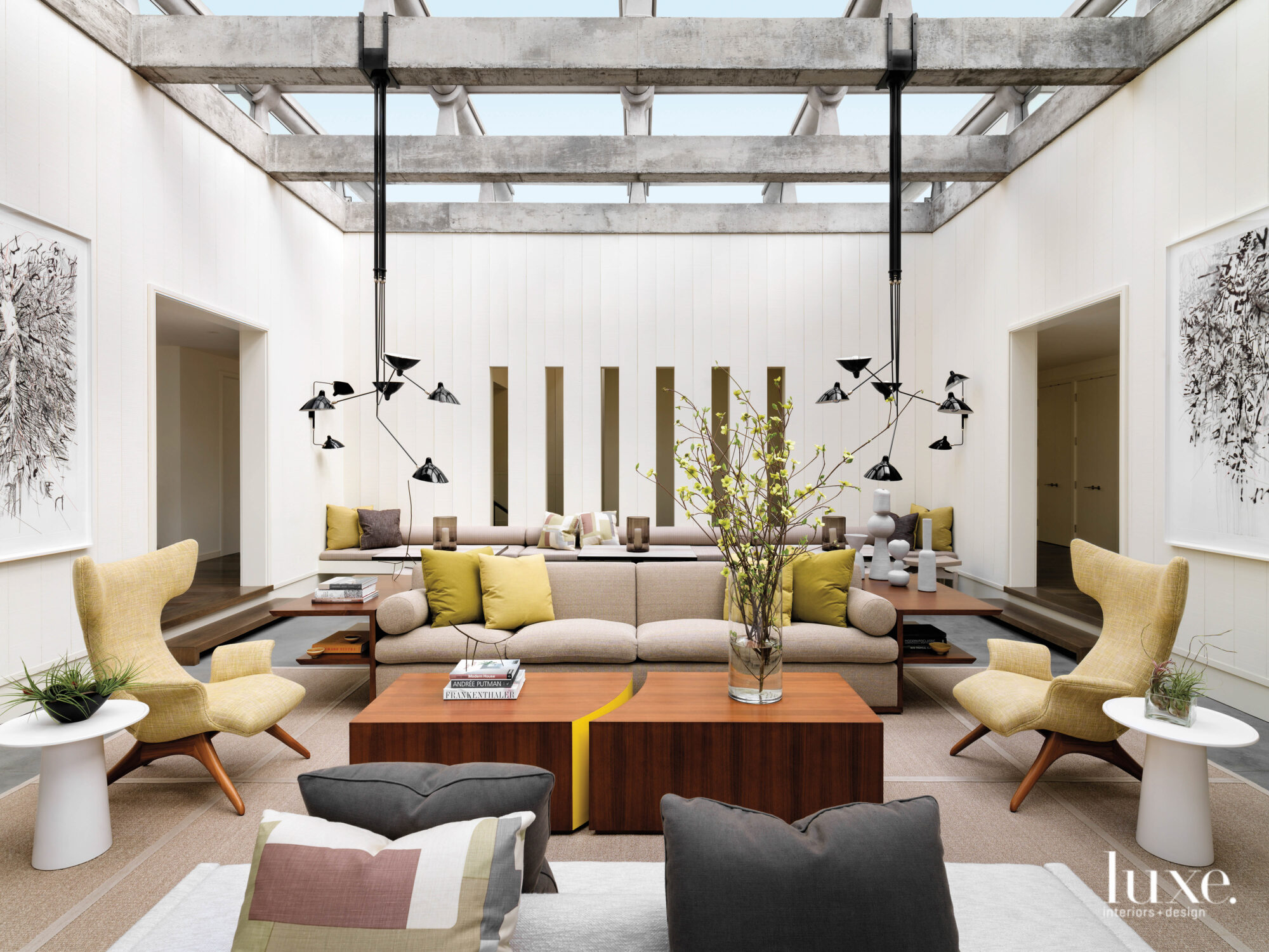 The living area is an atrium with a glass roof.