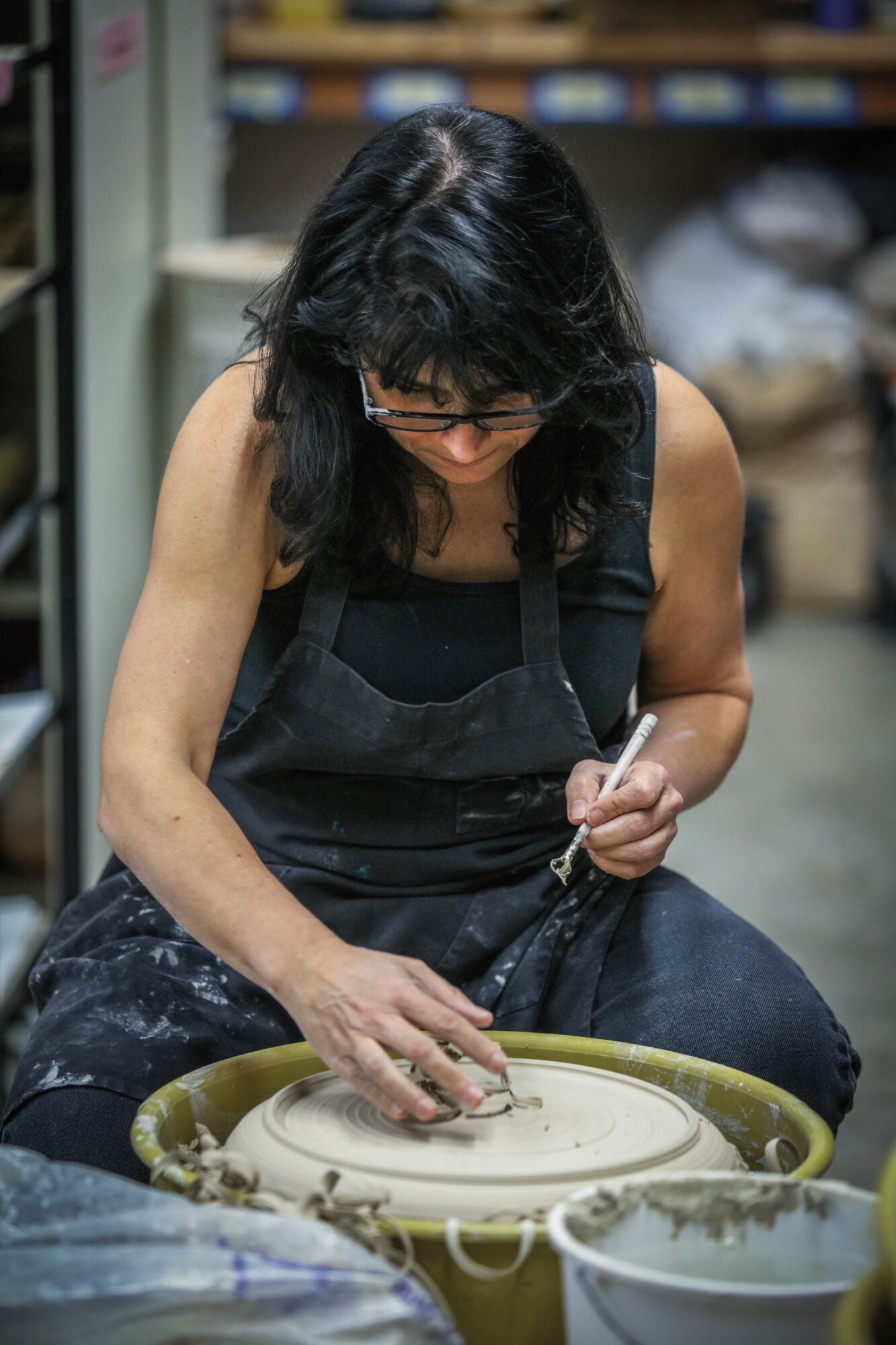 artist at a pottery wheel