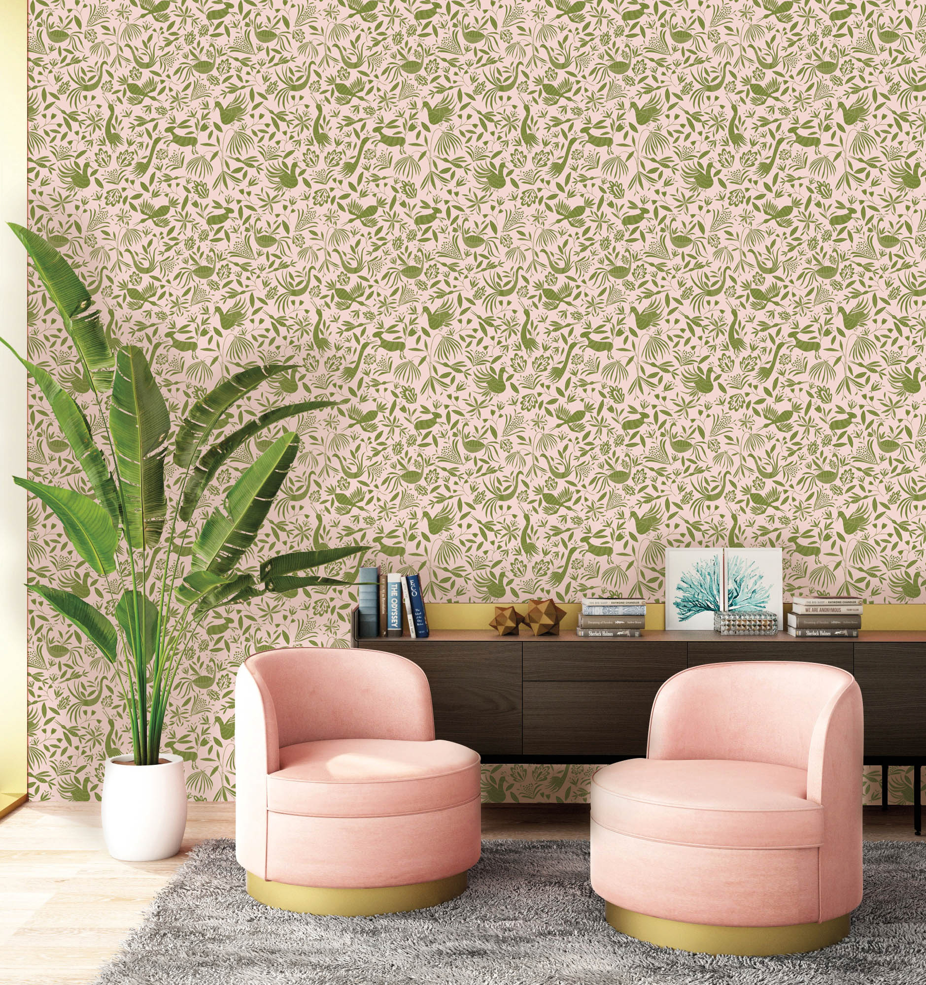 vignette of two pink chairs in front of wallpaper