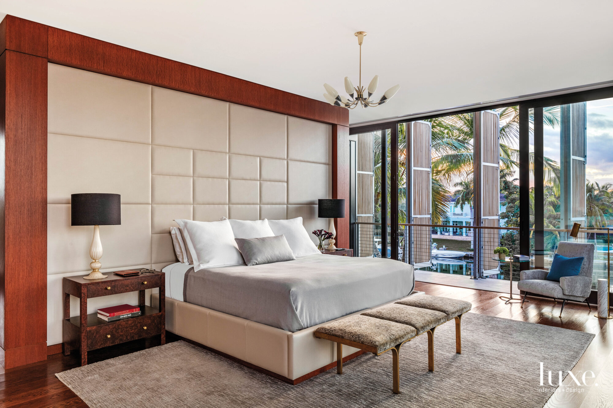 Master bedroom with leather headboard wall