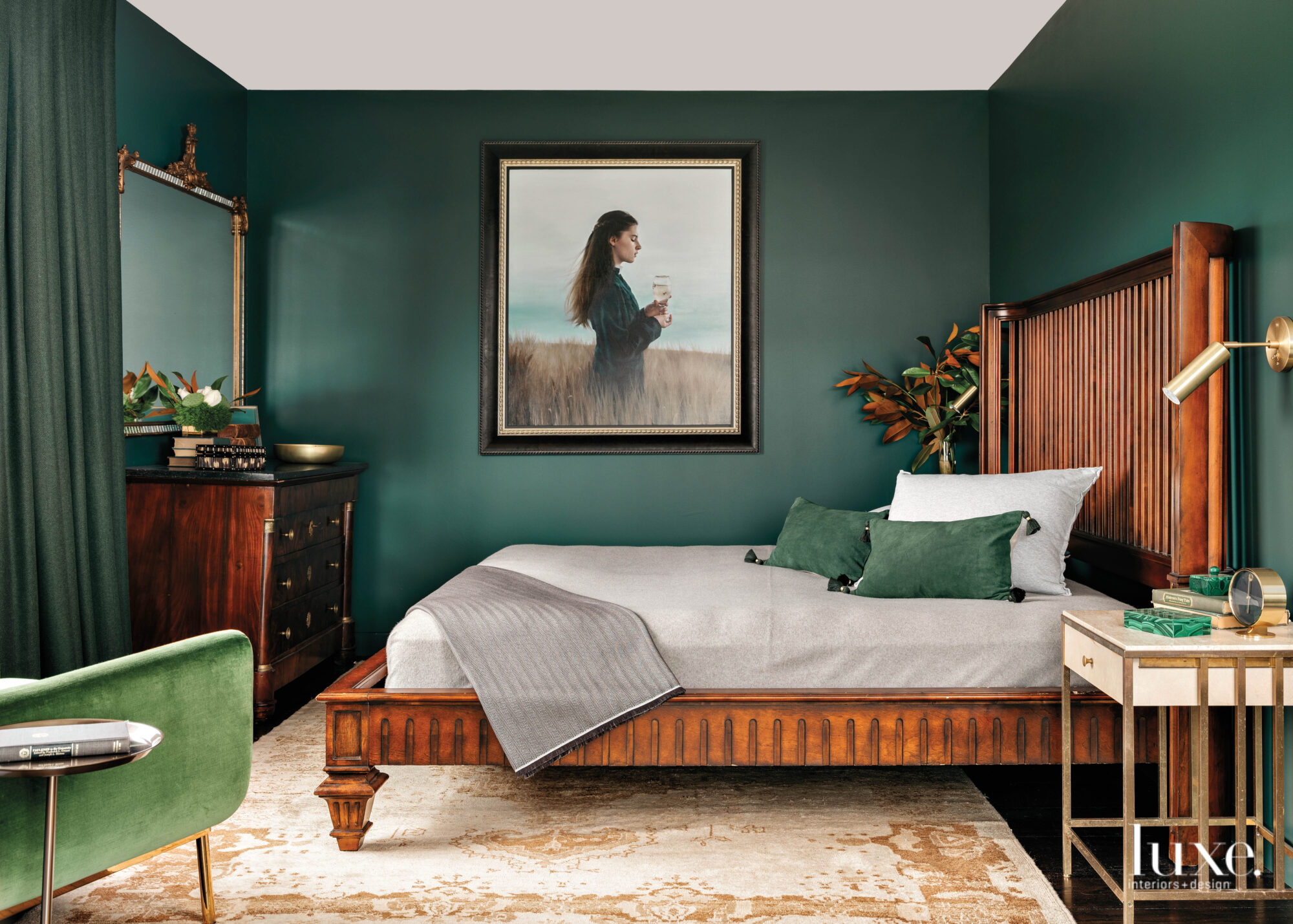 A guest bedroom is done in shades of green.