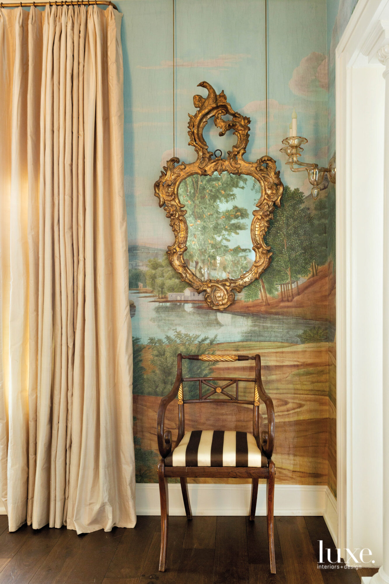 Scenic wallpaper with antique chair...