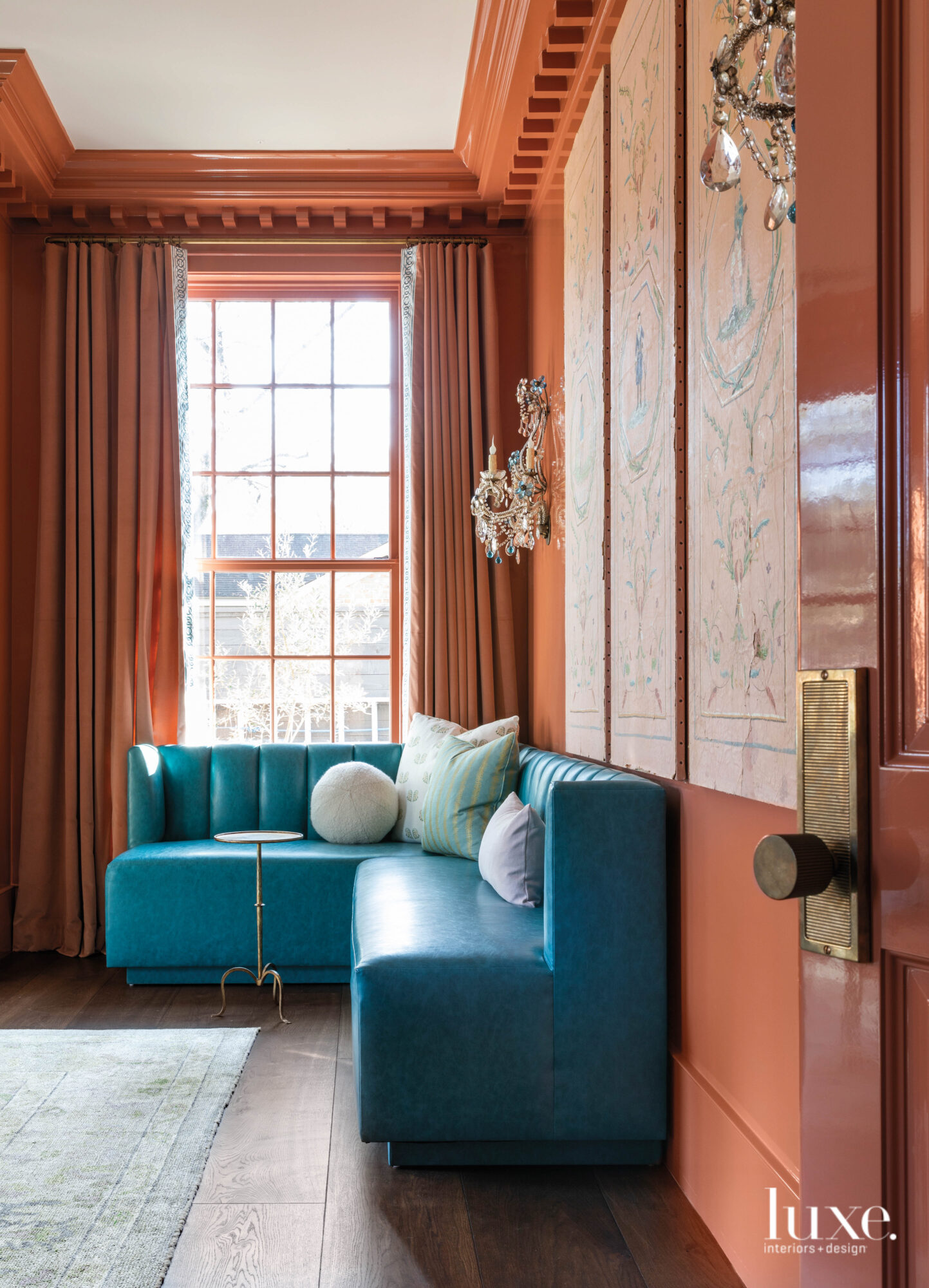 Living room seating area with teal banquette