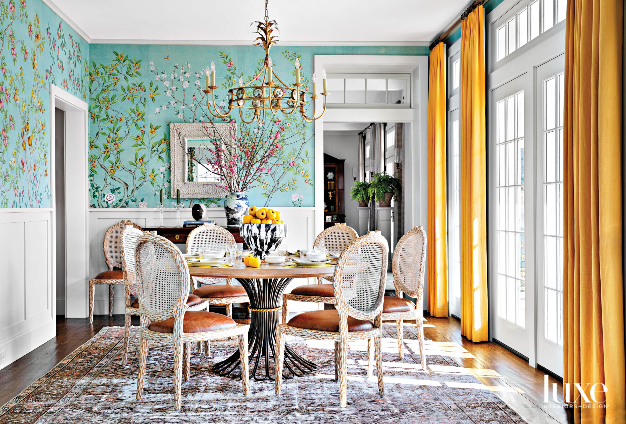 Breakfast room with floral wallpaper...
