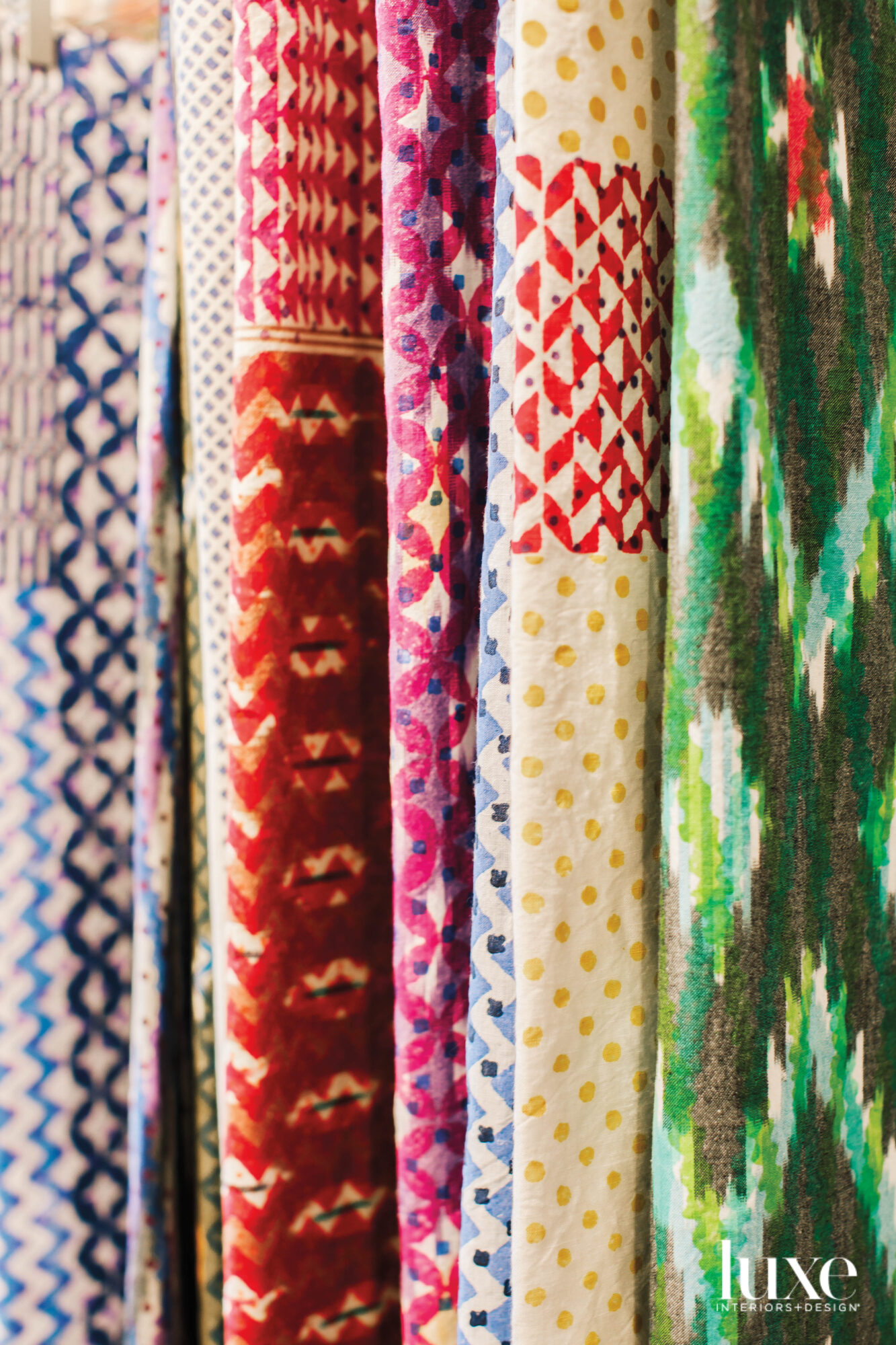 Collection of colorful hanging textiles