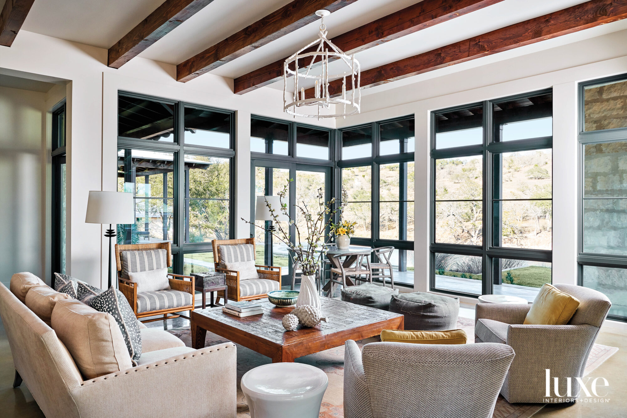 Great room seating area with expansive windows.