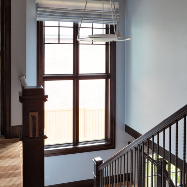 A Colorado Home Shines With A Refreshed Rugged Style Fitting For The Whole Family stairwell with hickory flooring