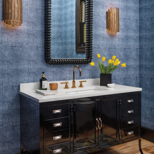 A Colorado Home Shines With A Refreshed Rugged Style Fitting For The Whole Family blue powder room with patterned wallcovering