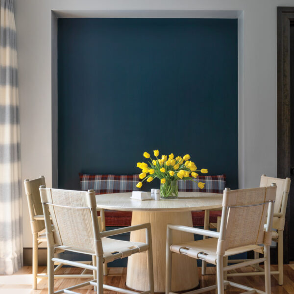 A Colorado Home Shines With A Refreshed Rugged Style Fitting For The Whole Family breakfast nook with teal accent wall
