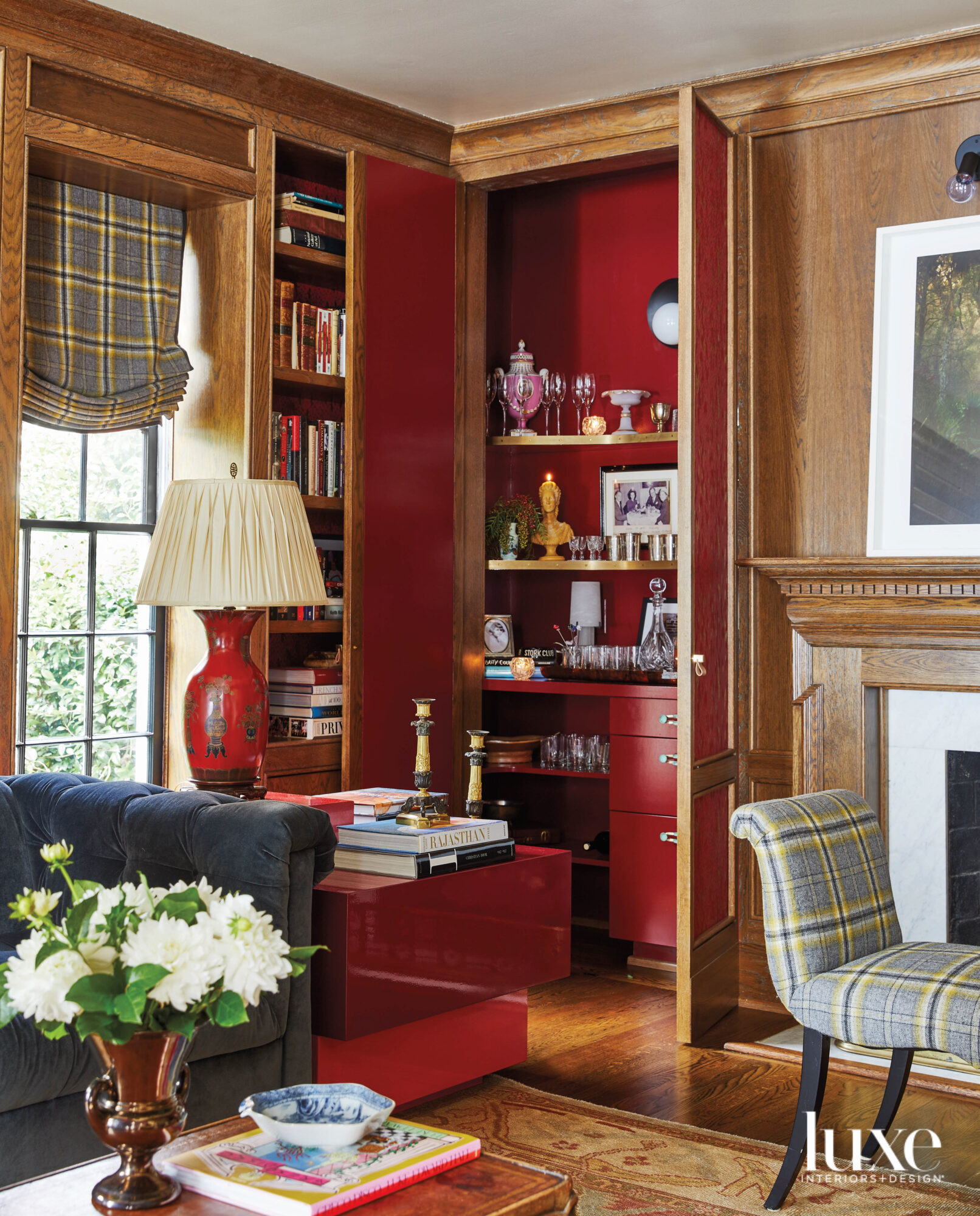 Red lacquered bar within wood-paneled wall