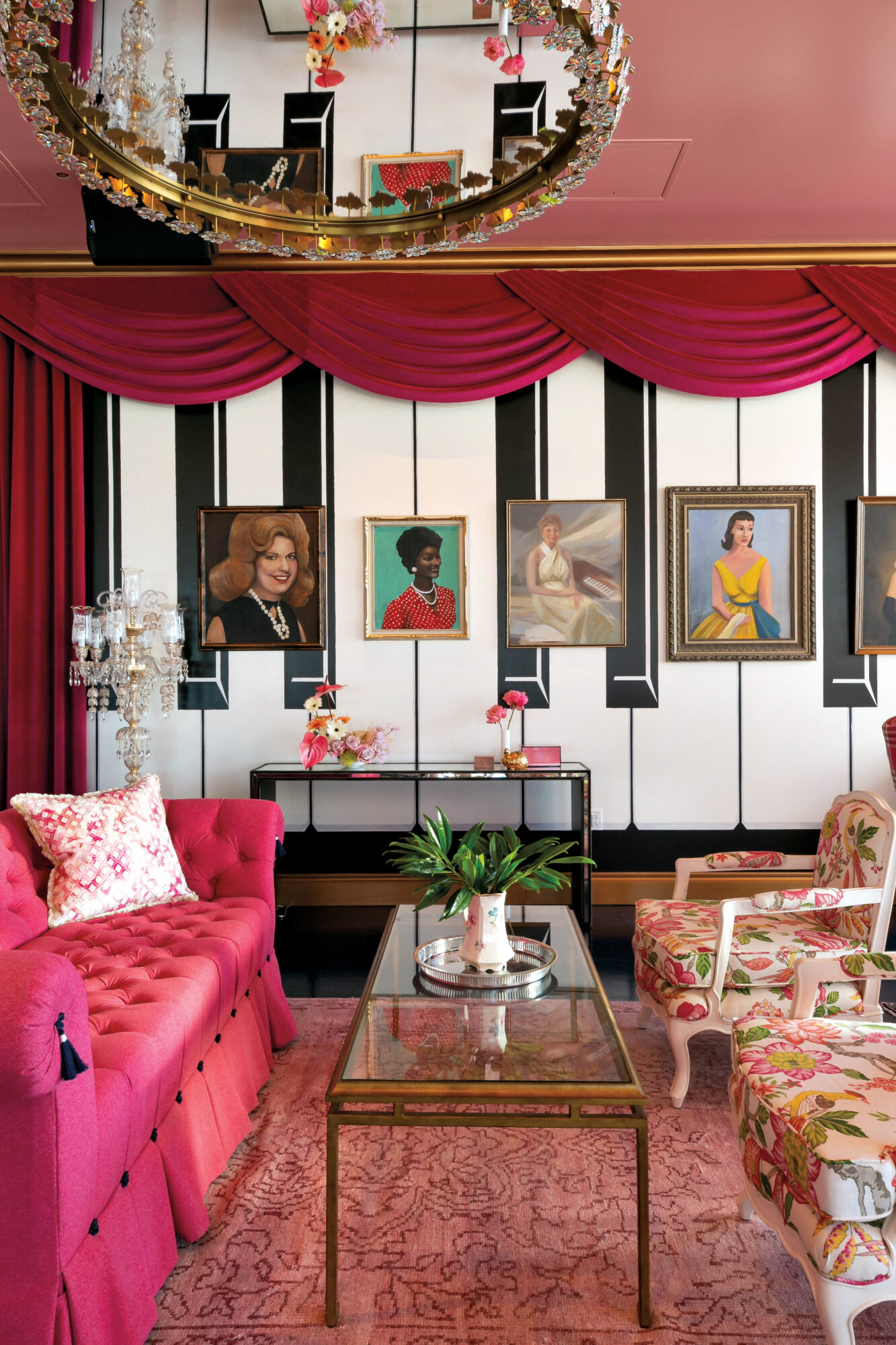 room with pink couches and rug