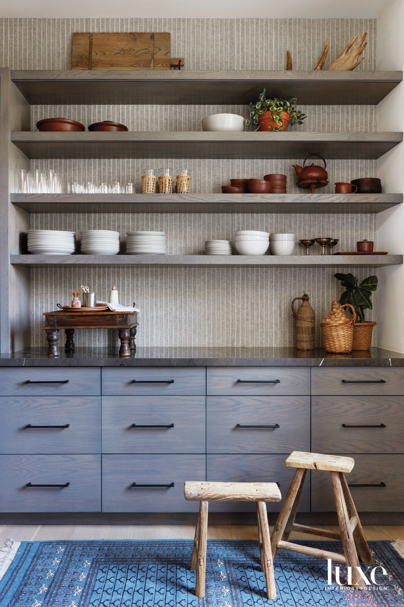 Pantry with stools and dishwater