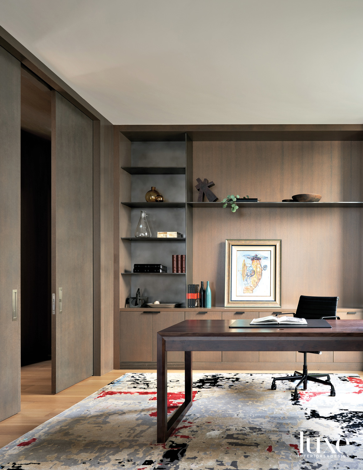 wood paneled office with desk...
