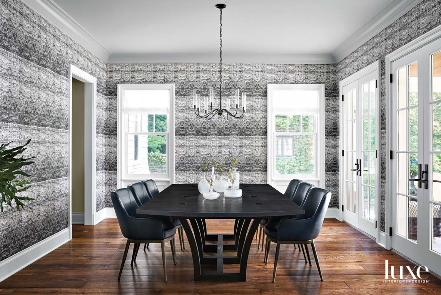 transitional dining room with black-and-white...