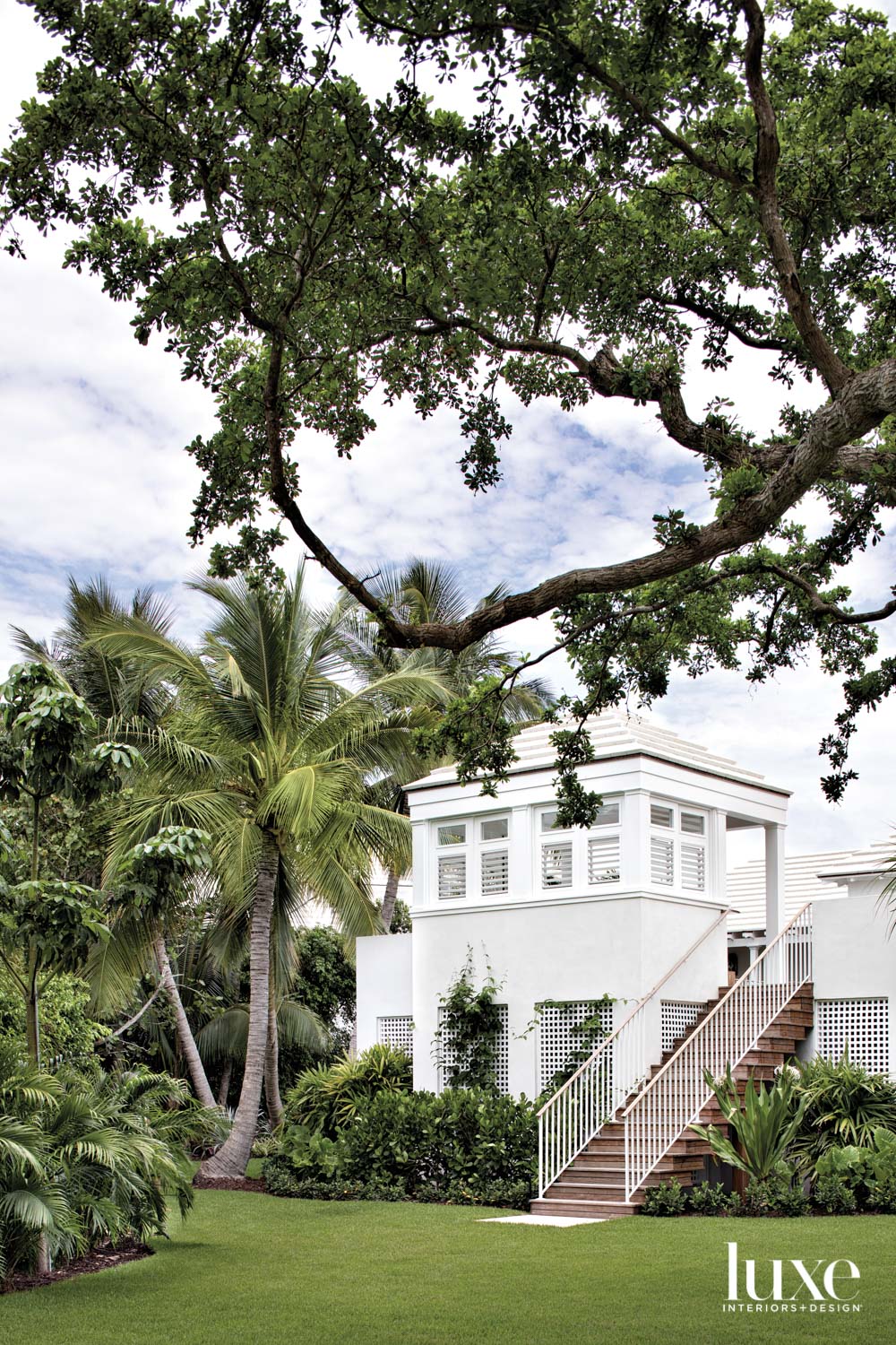 white key largo compound with stairs leading to lush grounds