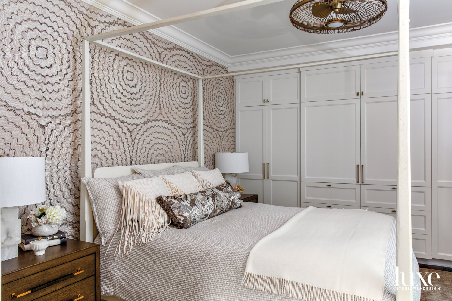 A guest bedroom features a...
