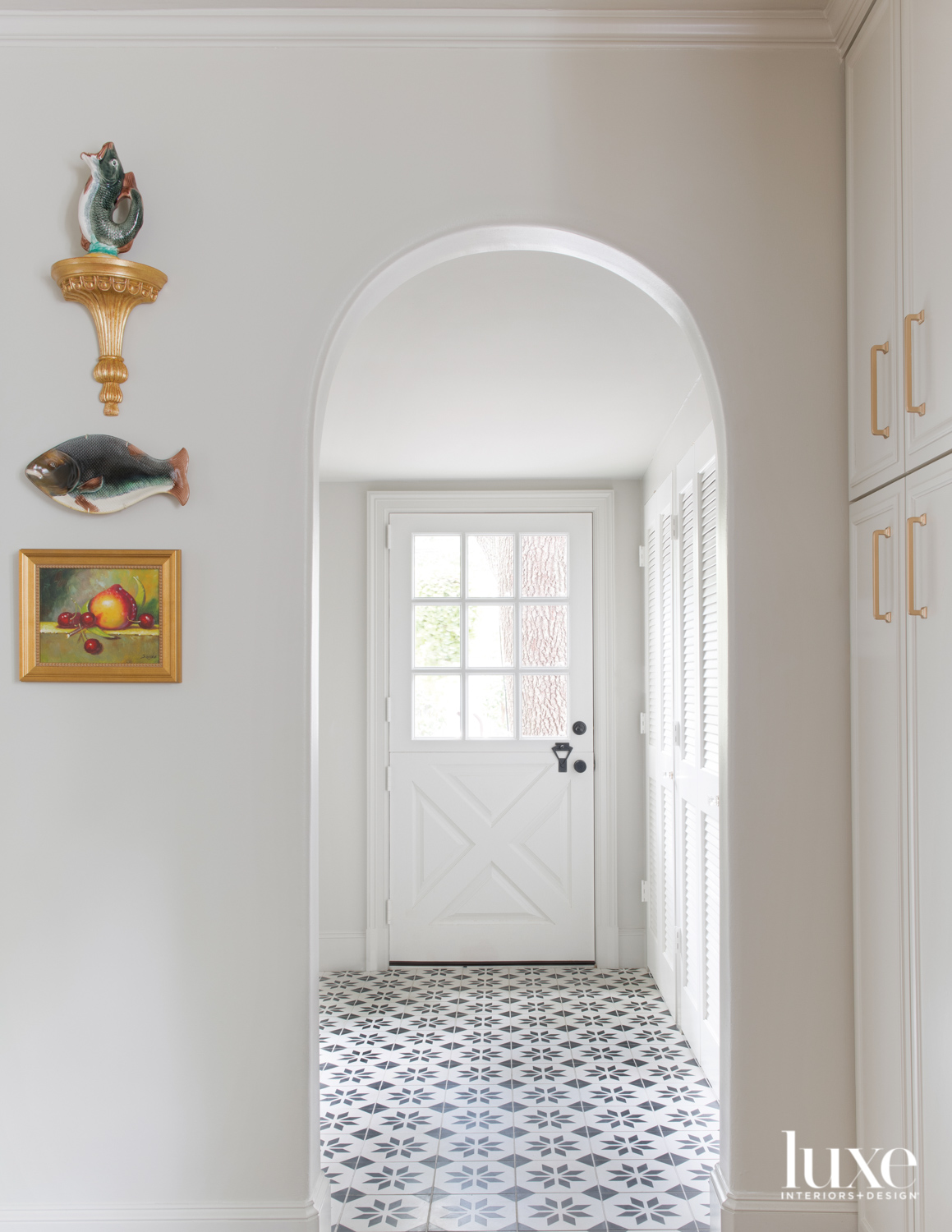 Entry with black and white flooring