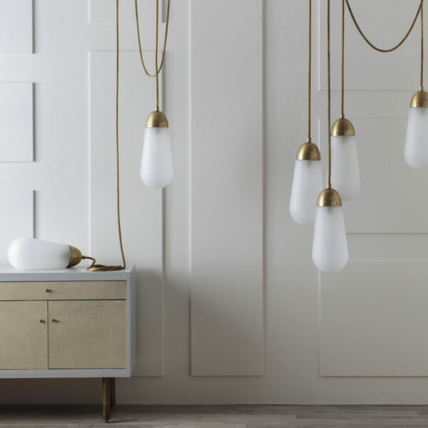 12 Lighting Fixtures That Will Spark A Love For Black + Brass