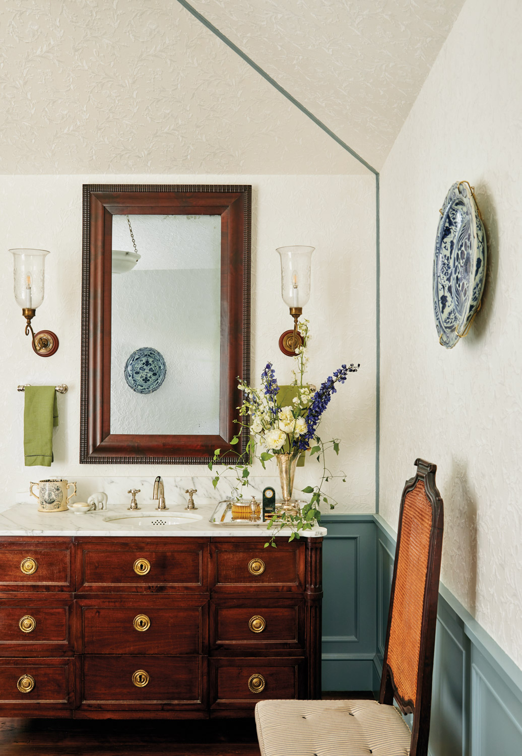 bathroom with antique wood chest as vanity