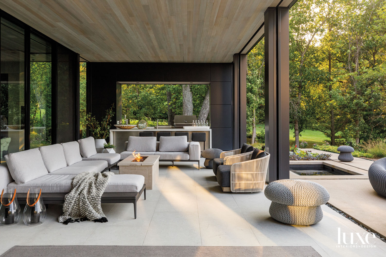 A covered patio with a...