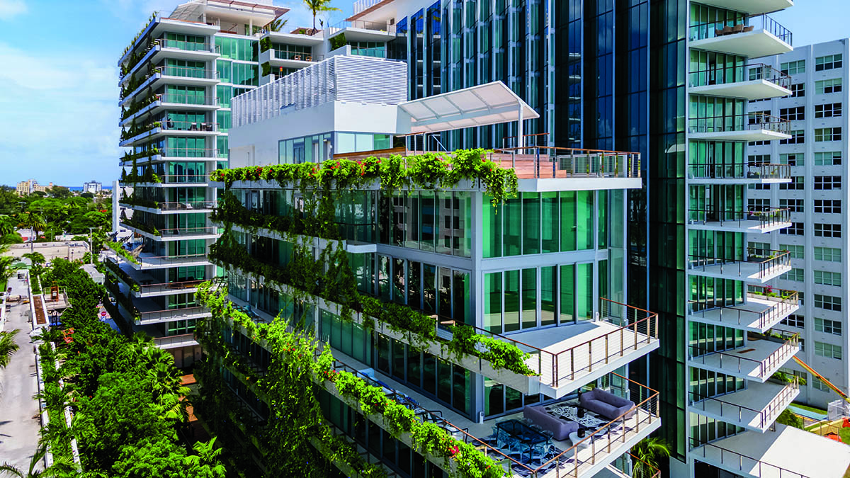 glass facade high-rise with greenery 
