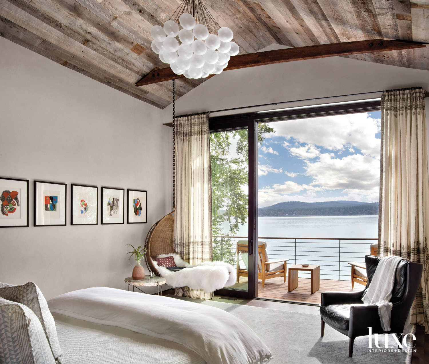 Bedroom facing lake view with...